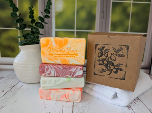 Mango Oasis Soaps and Box sitting on a table